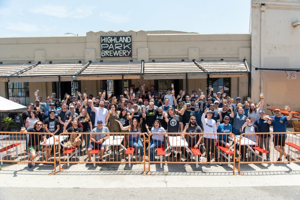 Group of people in front of brewery